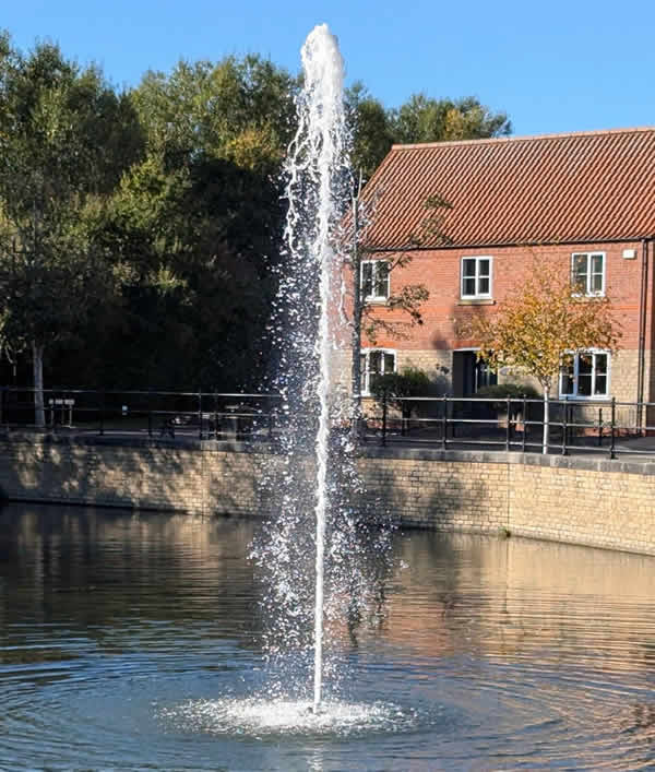 One of the two fountains at the entrance to Elsea Park in Bourne